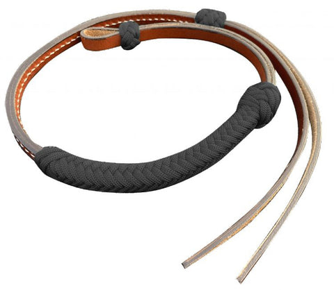 Leather and rope horse whip on a white background